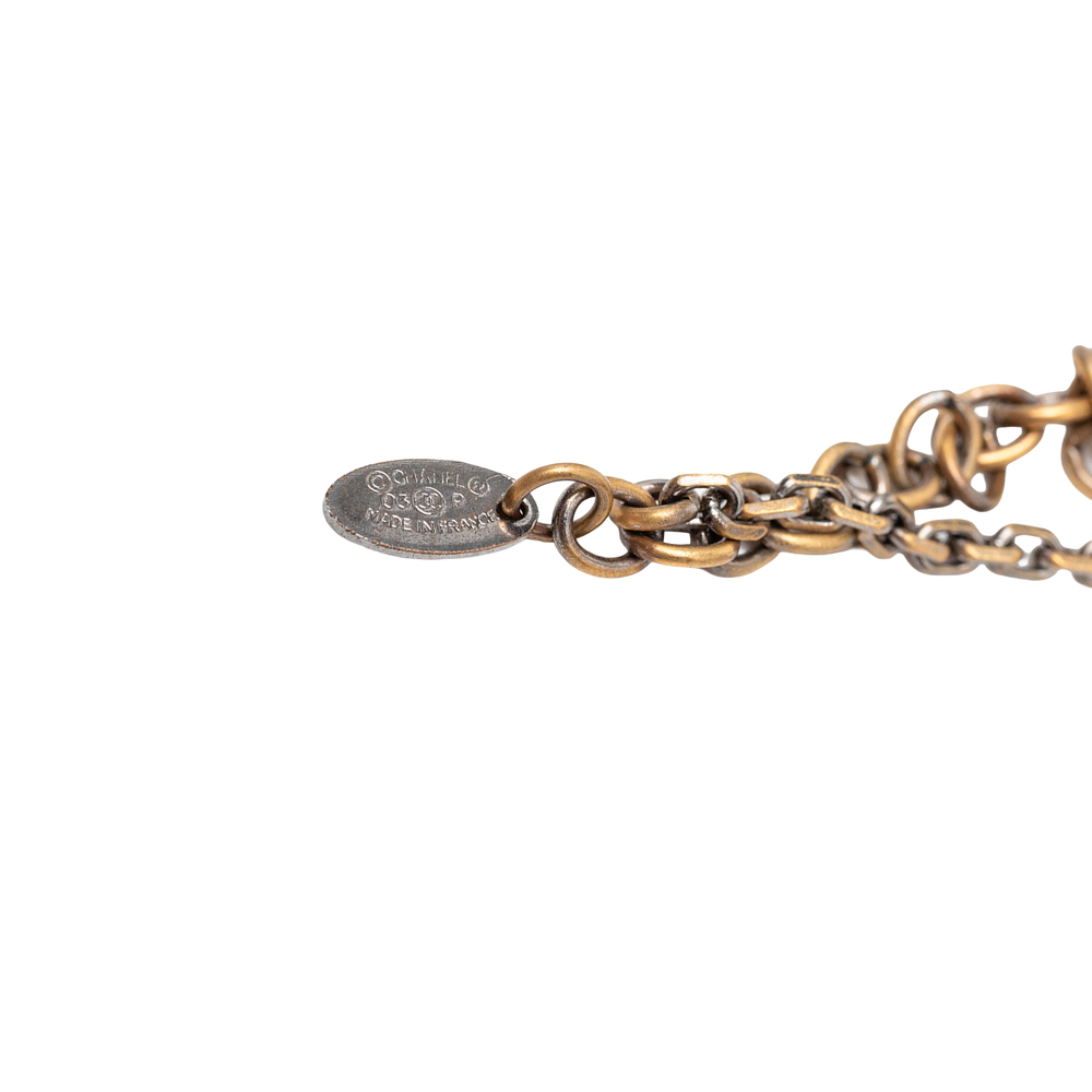 Pre-Loved Chanel CC Gold Plated Resin Crossbones Round Pendant Necklace - Picture 4 of 6